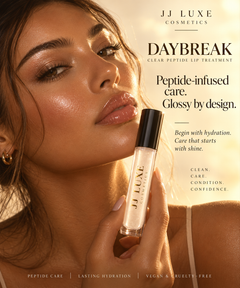 Daybreak Clear Peptide Lip Treatment model editorial with glossy black cap, reflective gold JJ Luxe Cosmetics logo, glossy lips, and peptide-infused care messaging