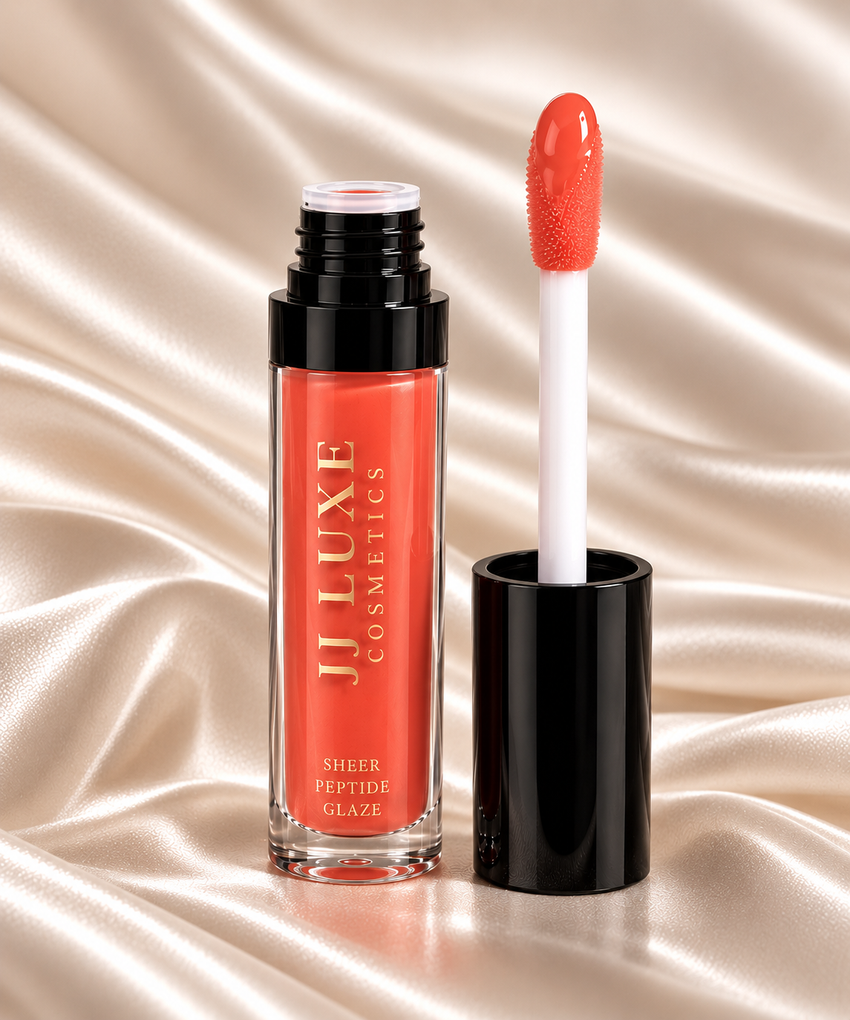 JJ Luxe Cosmetics Heatwave Sheer Peptide Glaze open tube and doe-foot applicator in a vivid sheer orange-coral shade