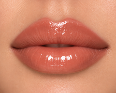 JJ Luxe Cosmetics Last Light Sheer Peptide Glaze on medium complexion lips