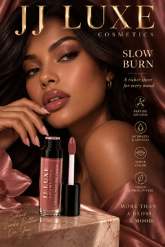 JJ Luxe Cosmetics Slow Burn Sheer Peptide Glaze luxury magazine-style editorial with medium-deep complexion model, glossy dusty rose-mauve lips, product tube, applicator, satin and peptide benefits
