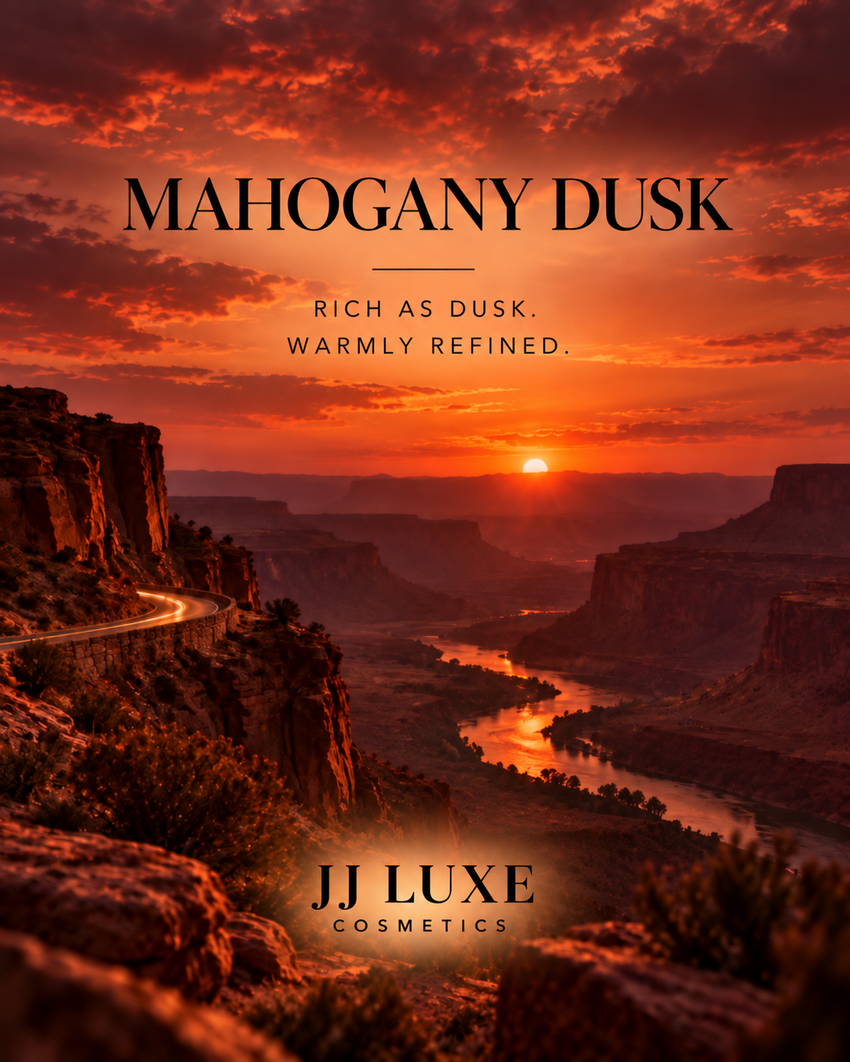 Mahogany Dusk Sundown scenic editorial: a panoramic desert canyon and winding river under orange-red sunset skies, with the words Rich as Dusk. Warmly Refined. and JJ Luxe Cosmetics branding.