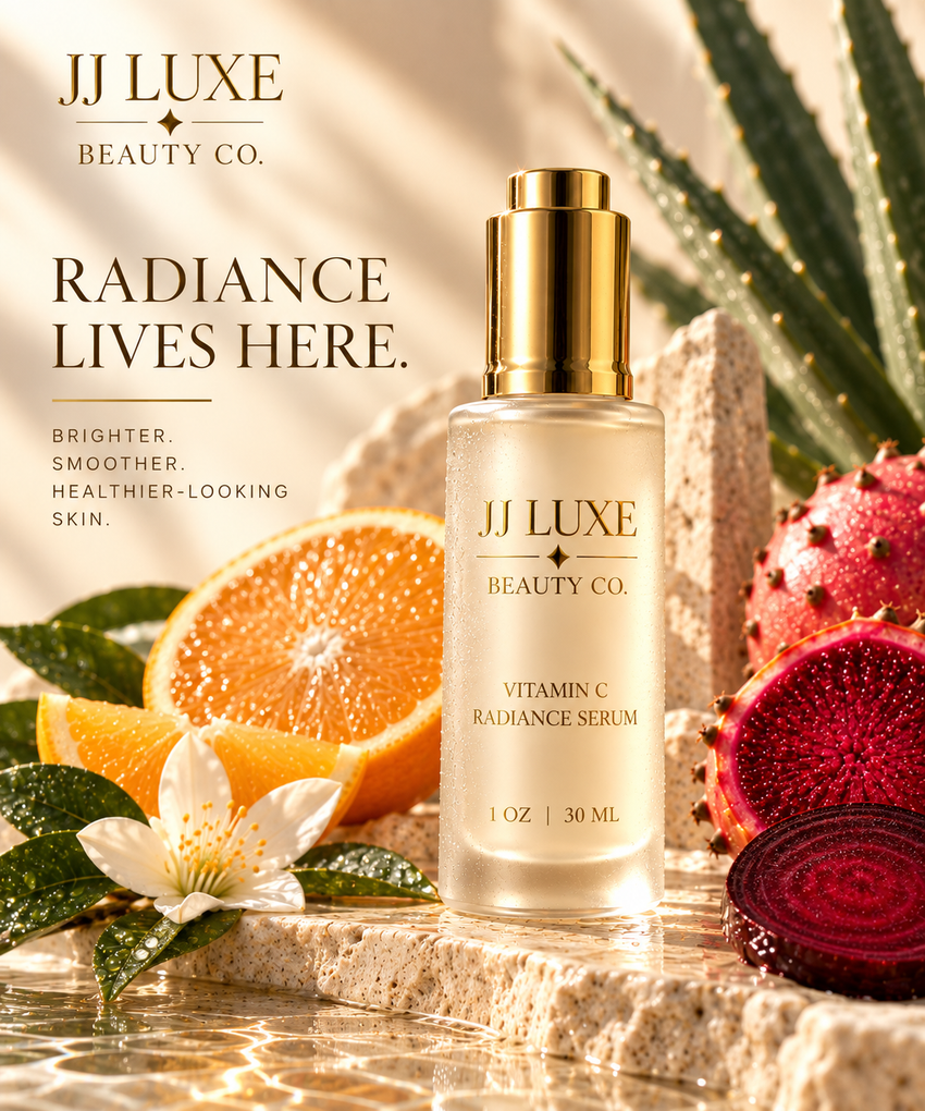 JJ Luxe Beauty Co. Vitamin C Radiance Serum editorial featuring the frosted 1 oz serum bottle with reflective gold push-button dropper, orange, prickly pear, beetroot, agave and white blossom